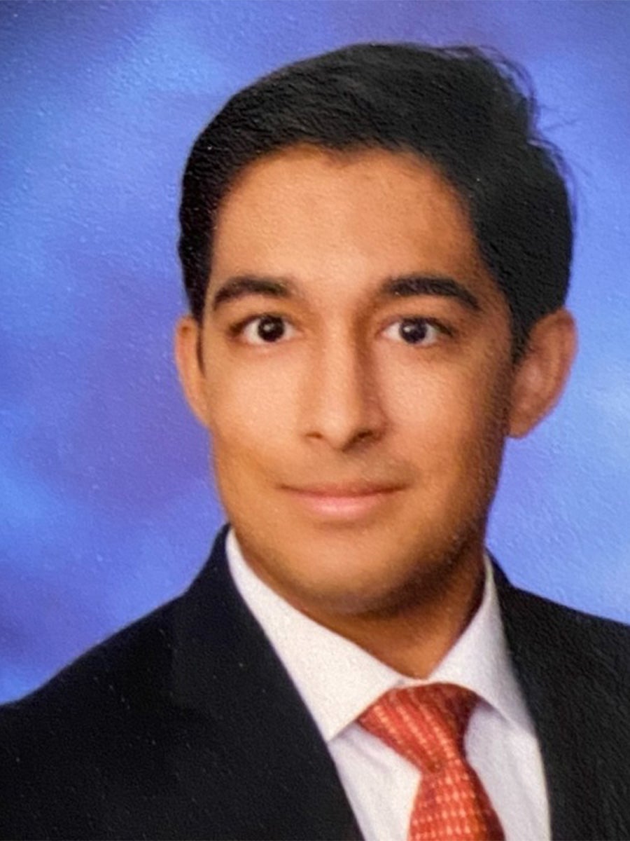 Aryaanduggal's headshot features him in a suit jacket with a red tie.