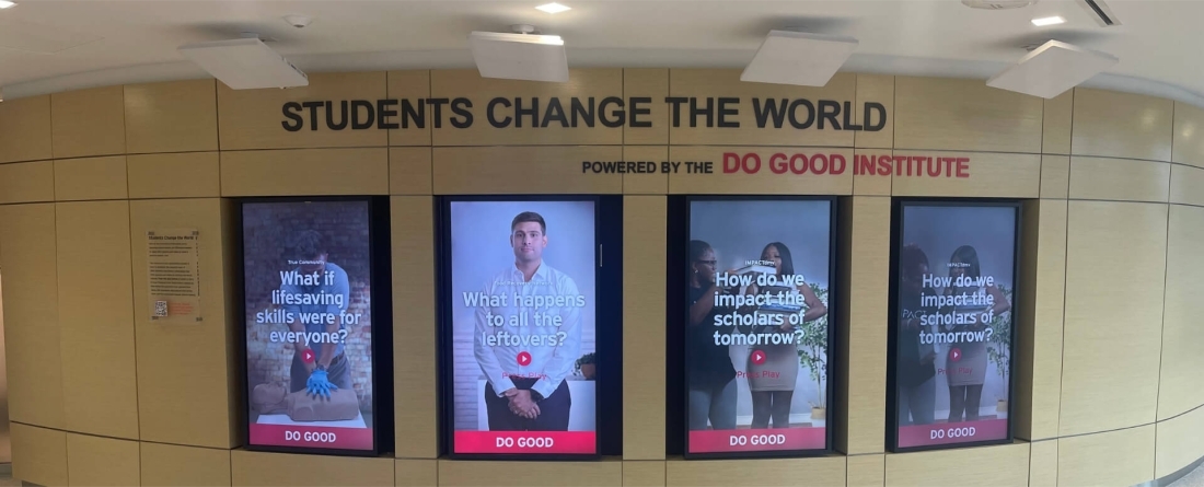 An image of the four interactive screens displayed at Thurgood Marshall Hall for the Students Change the World exhibit.